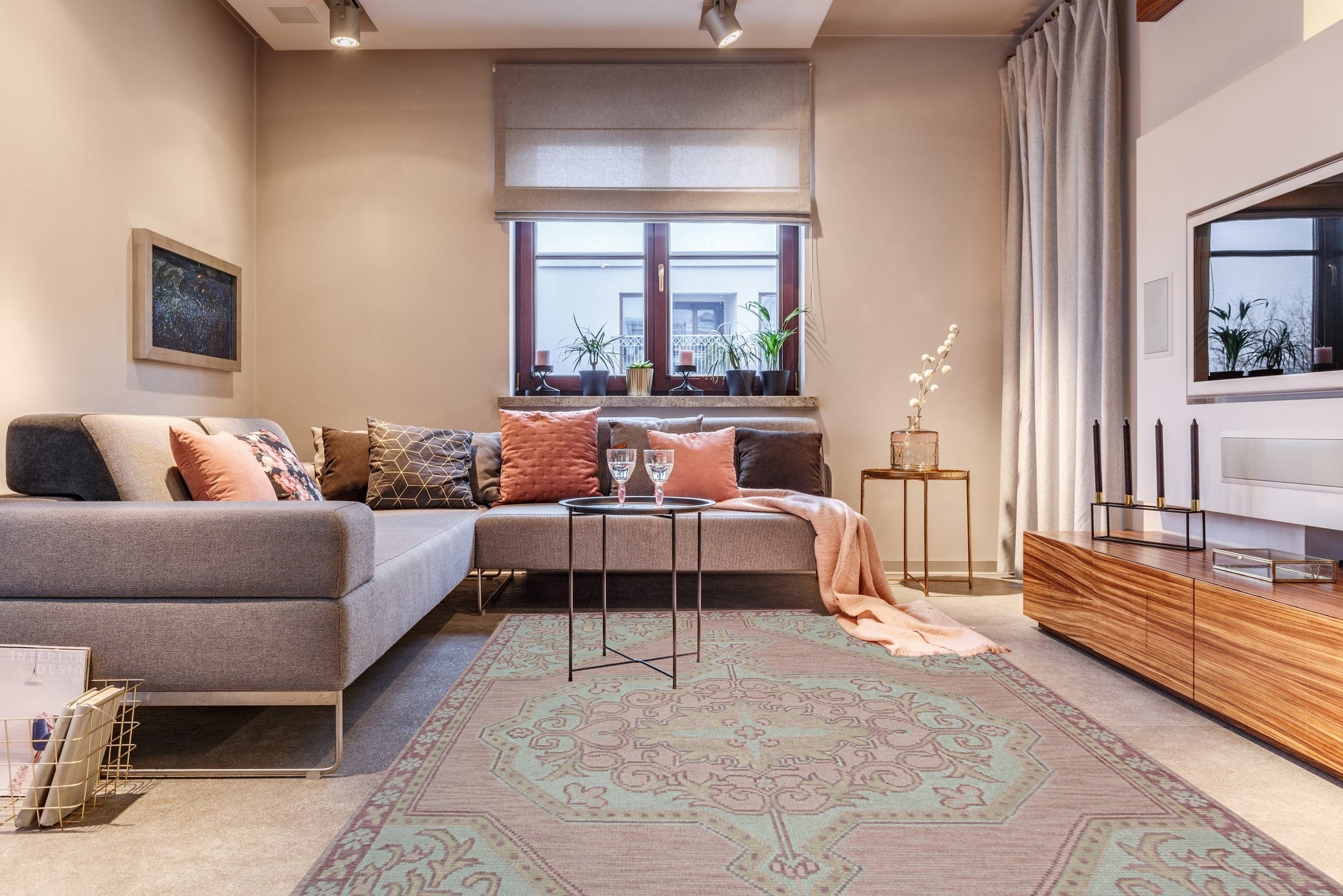 Lydia Oriental Pink Hand Knotted Wool Rug, warm hues bloom in a detailed oriental pattern. Crafted from hand-knotted wool, a pink and cream masterpiece anchors a bright living space.