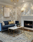 Unique Comfortable Blue Hand Knotted Wool Rug, its cool blue tones and intricate hand-knotted wool design displayed in a styled interior setting.