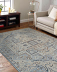 Unique Comfortable Blue Hand Knotted Wool Rug, featuring a vibrant, textured blue pile with subtle variations in tone, its hand-knotted construction evident in the intricate detailing and luxurious feel, seen in a styled room setting to showcase scale and ambiance.