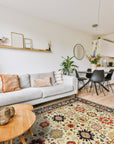 Handcrafted Xena Ivory Hand Knotted Wool Rug, its plush pile and subtle textures adding warmth to a brightly lit room.