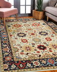 Violet Traditional Ivory Hand Knotted Wool Rug, a detailed close-up revealing its intricate hand-knotted construction and ivory hues, highlighting the traditional patterns and wool texture.