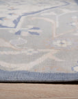 Stylish Trendy Ivory Hand Knotted Wool Rug, its soft ivory tones and intricate hand-knotted texture creating a welcoming ambiance in a modern living space.