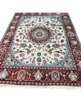 Timeless Cozy Ivory Hand Knotted Wool & Silk Rug, showcasing soft ivory tones and a subtle, elegant pattern. Hand-knotted construction visible in the high-resolution detail.