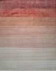 Isolated view of Isla Striped Rust Hand Tufted Wool Rug, showcasing bold, earth-toned stripes in varying widths against a neutral background.