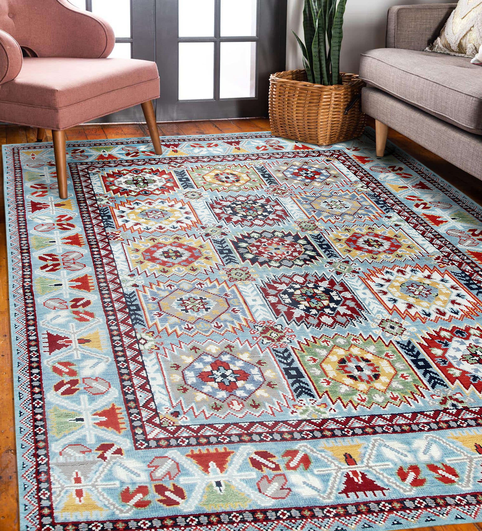 Modern Stylish Blue Hand-Knotted Wool Rug, a vibrant blue wool rug featuring a modern geometric design, lies elegantly on a light wood floor.