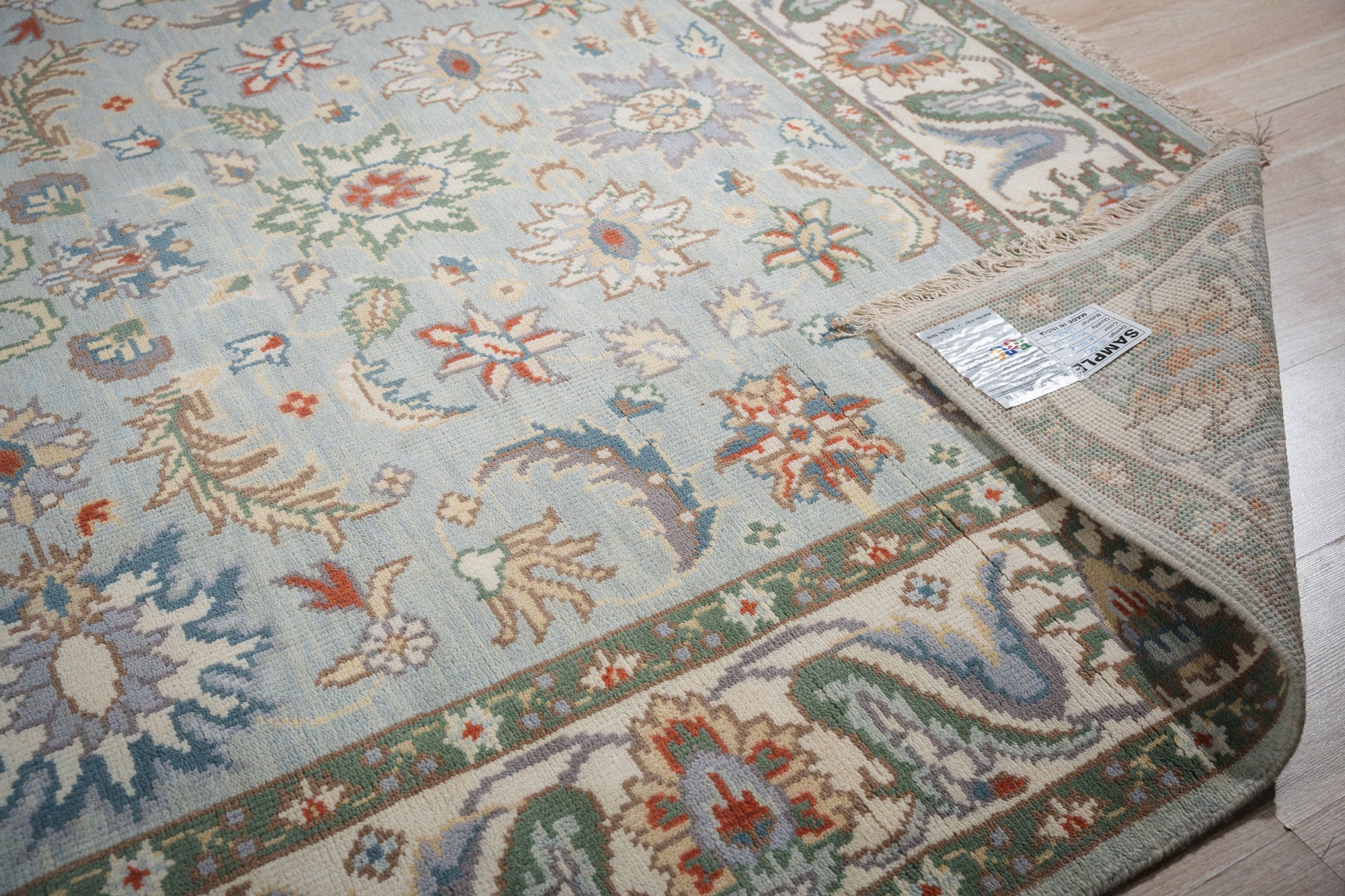 Stylish Elegant Blue Hand-Knotted Wool Rug, a vibrant blue wool rug with intricate hand-knotted detailing, displayed in a modern living space.
