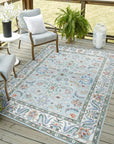 Stylish Elegant Blue Hand-Knotted Wool Rug displayed on a light wooden floor, showcasing its intricate hand-knotted construction and rich blue hues.