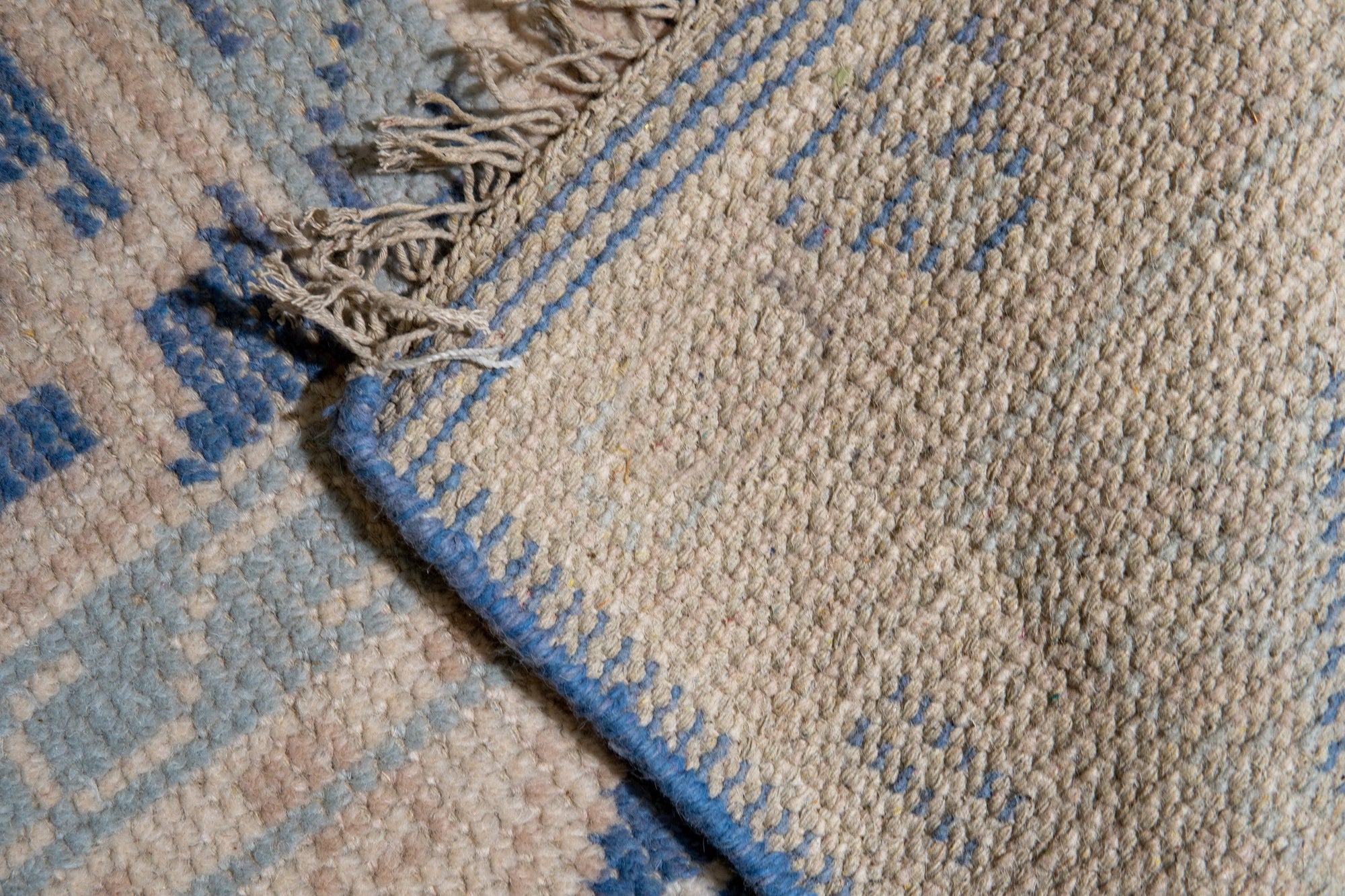 Bespoke Oriental Blue Hand Knotted Wool Rug, blending cool blues with intricate, hand-knotted detailing, filling a bright, contemporary living space.