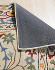 Ruby Fiona Ivory Hand Tufted Wool Rug, showcasing a textured ivory surface with subtle, abstract patterns, hand-tufted for luxurious feel and visual depth.