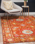 Willow Jade Rust Hand Tufted Wool Rug, a blend of jade green, rust, and cream hues, seen in a living room setting with mid-century modern furniture.