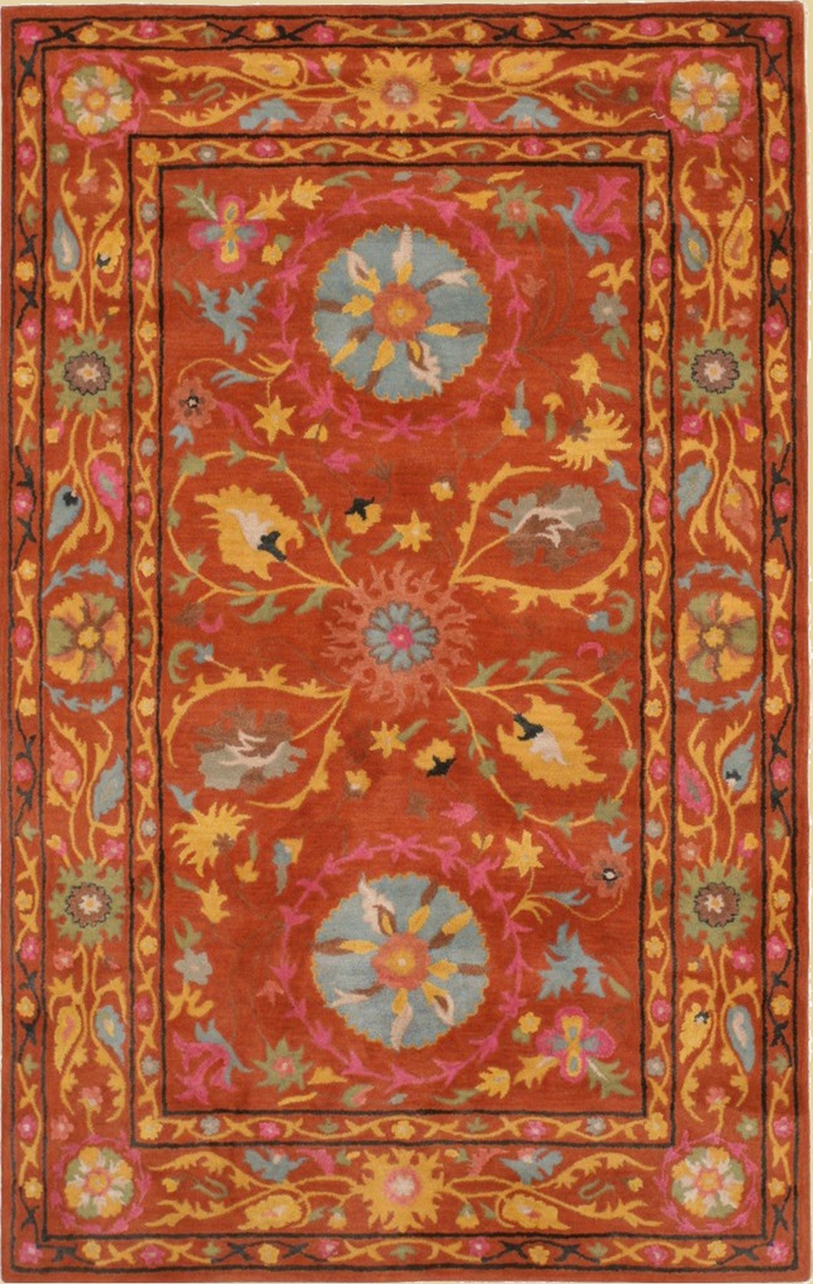 Willow Jade Rust Hand Tufted Wool Rug, showcasing its intricate, earthy design of jade green and rust tones against a lighter background.
