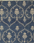Isolated view of Luxurious Chloe Blue Hand Knotted Wool Rug, showcasing its intricate, swirling floral design in shades of blue and cream.