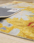 Given the rug title "Kira Quinn Gold Hand Tufted Rug" and the image position being 4, here's a suitable alt text:
 
 Kira Quinn Gold Hand Tufted Rug, blends golden hues with soft textures, hand-tufted construction creating a luxurious centerpiece.