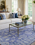 Rustic Oriental Blue Hand Tufted Wool Rug styled in an elegant traditional living room with white sofa and navy blue accents - area rug lifestyle photo