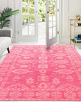 Opulent Oriental Pink Hand Tufted Wool Rug, a pink and wool rug with an oriental design, seen in a well-lit interior setting, showcasing intricate detailing and soft texture.