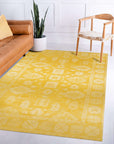 Comfortable Oriental Yellow Hand Tufted Wool Rug, its warm yellow hues and hand-tufted texture adding a touch of handcrafted luxury to a modern living space.