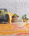 Timeless Elena Orange Hand Tufted Wool Rug anchors a bright living space. Warm orange tones and hand-tufted wool construction create a inviting texture underfoot.