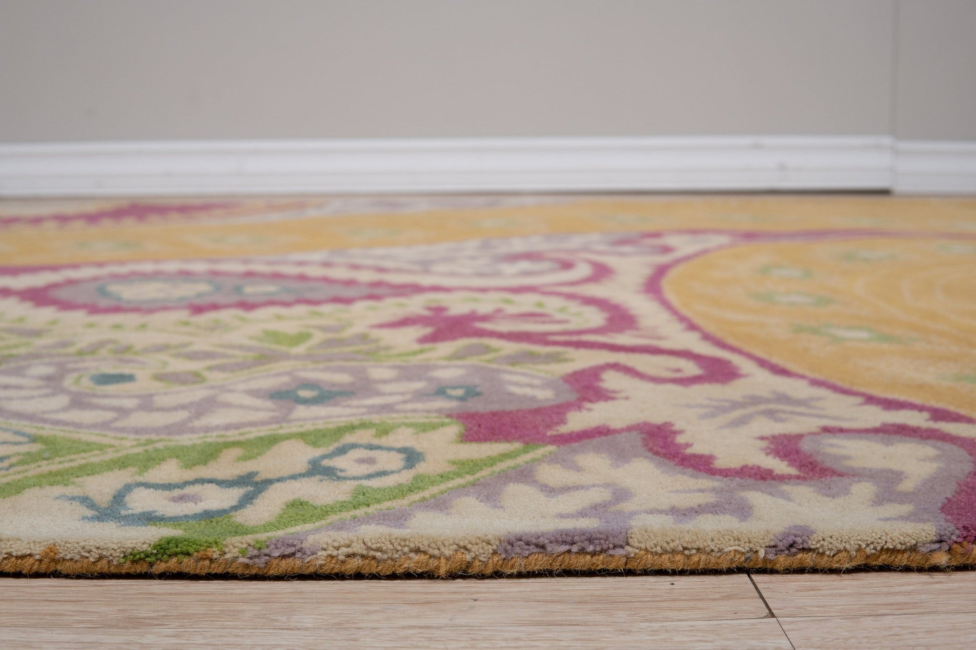 Timeless Elena Orange Hand Tufted Wool Rug, radiating warmth with its orange hues and hand-tufted wool texture, complements a modern living space.