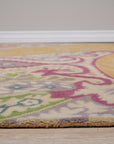 Timeless Elena Orange Hand Tufted Wool Rug, radiating warmth with its orange hues and hand-tufted wool texture, complements a modern living space.