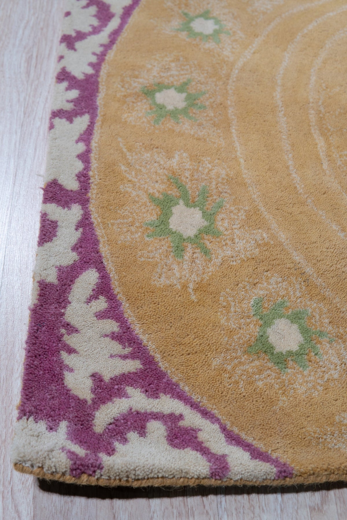Timeless Elena Orange Hand Tufted Wool Rug, warm orange wool rug with a subtly textured, geometric pattern, anchors a modern living room with neutral furniture and abundant natural light.