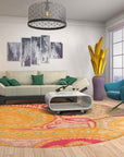 Timeless Elena Orange Hand Tufted Wool Rug nestled under a modern coffee table, its warm orange hues and hand-tufted texture adding a cozy, inviting feel to the living room.