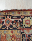 Exquisite Traditional Red Hand Knotted Wool Rug, vibrant red wool hand-knotted rug featuring intricate traditional patterns, presented in a home setting.