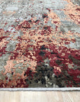 Isla Sumptuous Gray Hand Knotted Wool Rug, a plush gray wool rug with subtle variations in pile height and texture, creating a luxurious and inviting floor covering in a well-lit space.