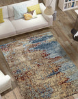 Rustic Fiona Gray Hand Knotted Wool Rug, a soft gray wool rug with a subtly distressed, vintage-inspired pattern, layered in a modern living room setting.