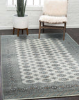 Rustic Nina Beige Nan Rug: Woven beige nan rug with a subtly textured surface, displayed in a bright, modern living room setting.