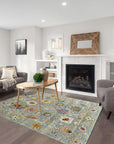 Talia Lila Gray Hand Knotted Wool Rug, a blend of soothing gray and subtle lilac hues in a textured, hand-knotted wool construction, lays elegantly on a light hardwood floor.