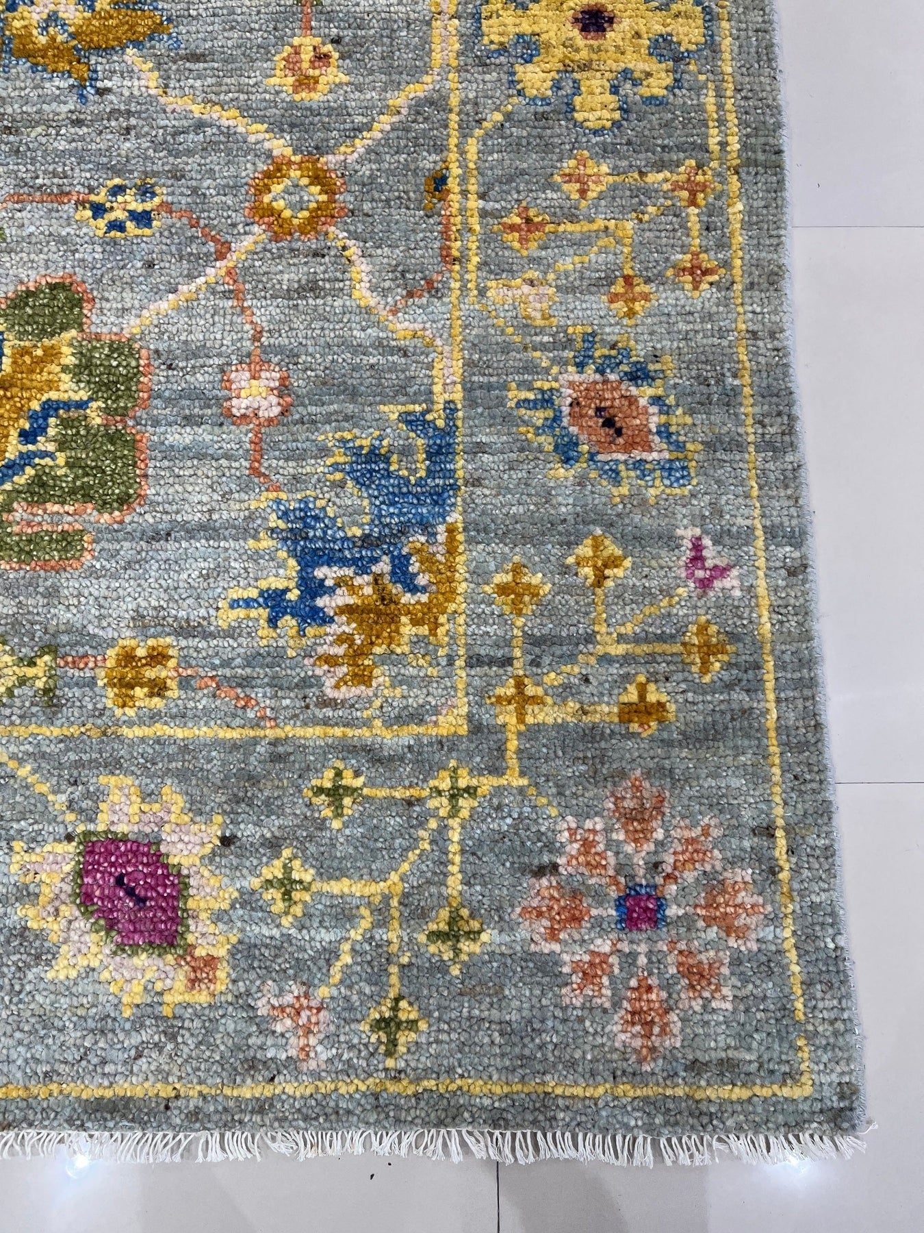 Talia Lila Gray Hand Knotted Wool Rug, showcasing subtle lilac and gray tones woven into a textured, hand-knotted design.