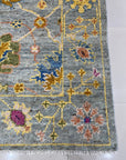 Talia Lila Gray Hand Knotted Wool Rug, showcasing subtle lilac and gray tones woven into a textured, hand-knotted design.