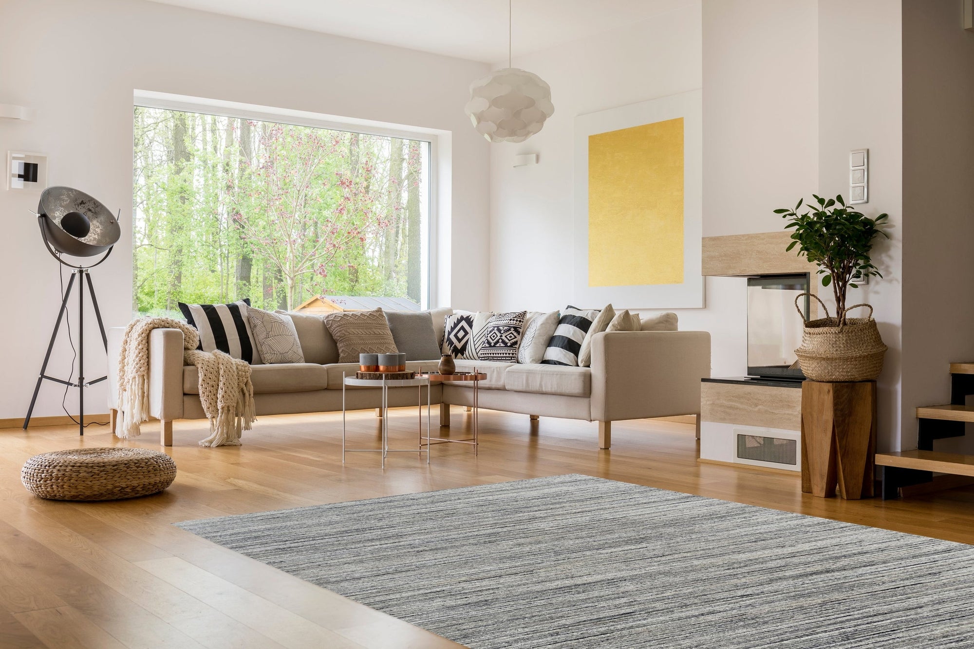 Delicate Striped Ivory Handmade Wool Rug, showcasing subtle ivory stripes in a living room setting, blending seamlessly with neutral furniture for a calming, textured floor covering.