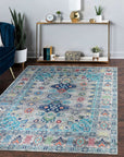 Jasmine Radiant Gray Hand Knotted Wool Rug, its intricate patterns shimmering softly in a well-lit living space; luxurious wool pile invites touch and defines the room's elegant aesthetic.
