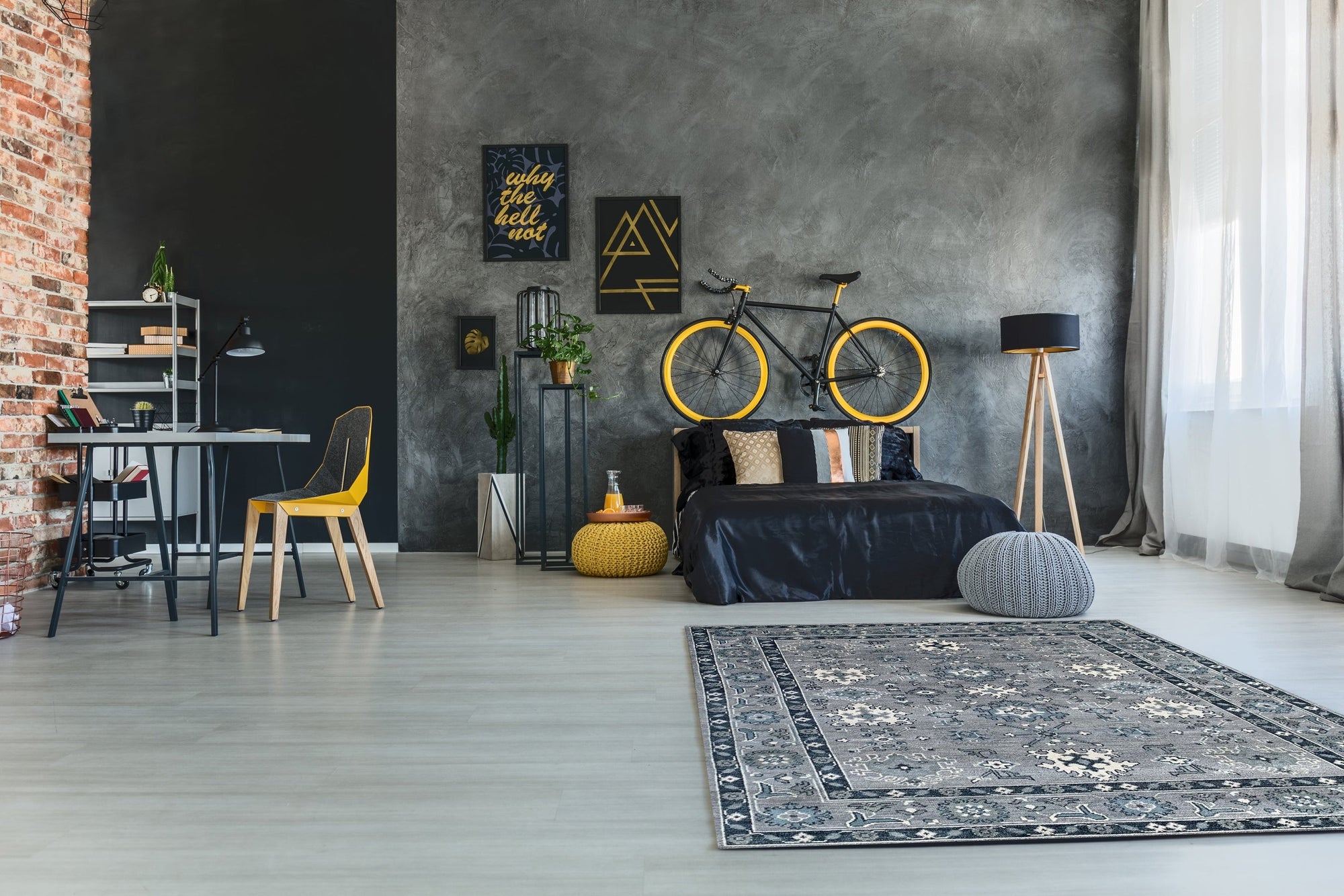 Maya Oushak Silver Hand Knotted Wool Rug, showcasing its intricate silver and neutral toned pattern across a soft wool texture, displayed in a brightly lit living space.