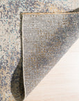 Lydia Cassandra Gray Hand Knotted Wool Rug, soft gray hues and subtle geometric patterns create a sophisticated focal point in a bright, modern living space.