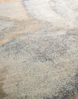 Lydia Cassandra Gray Hand Knotted Wool Rug in a living room setting, its intricate pattern complementing modern furniture.