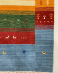 Timeless Gabbeh Blue Handmade Wool Rug, vibrant blue wool with a traditional Gabbeh design, fills the frame showcasing its texture and color variations.