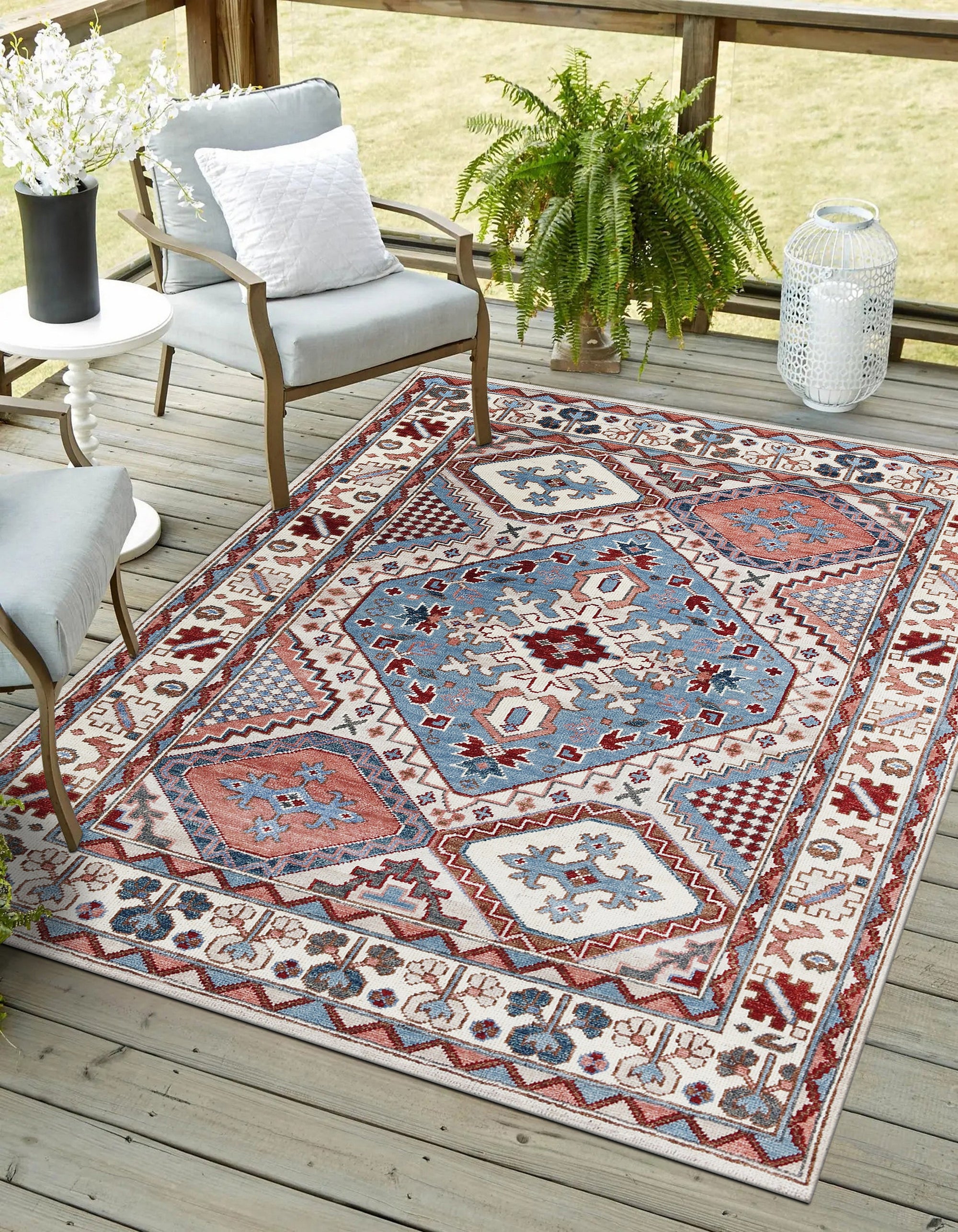 Rustic Isla Gray Hand Knotted Wool Rug, its intricate knotting and subtle gray tones anchoring a bright, airy living room. Soft light highlights the rug's texture beneath a modern coffee table and sofa.