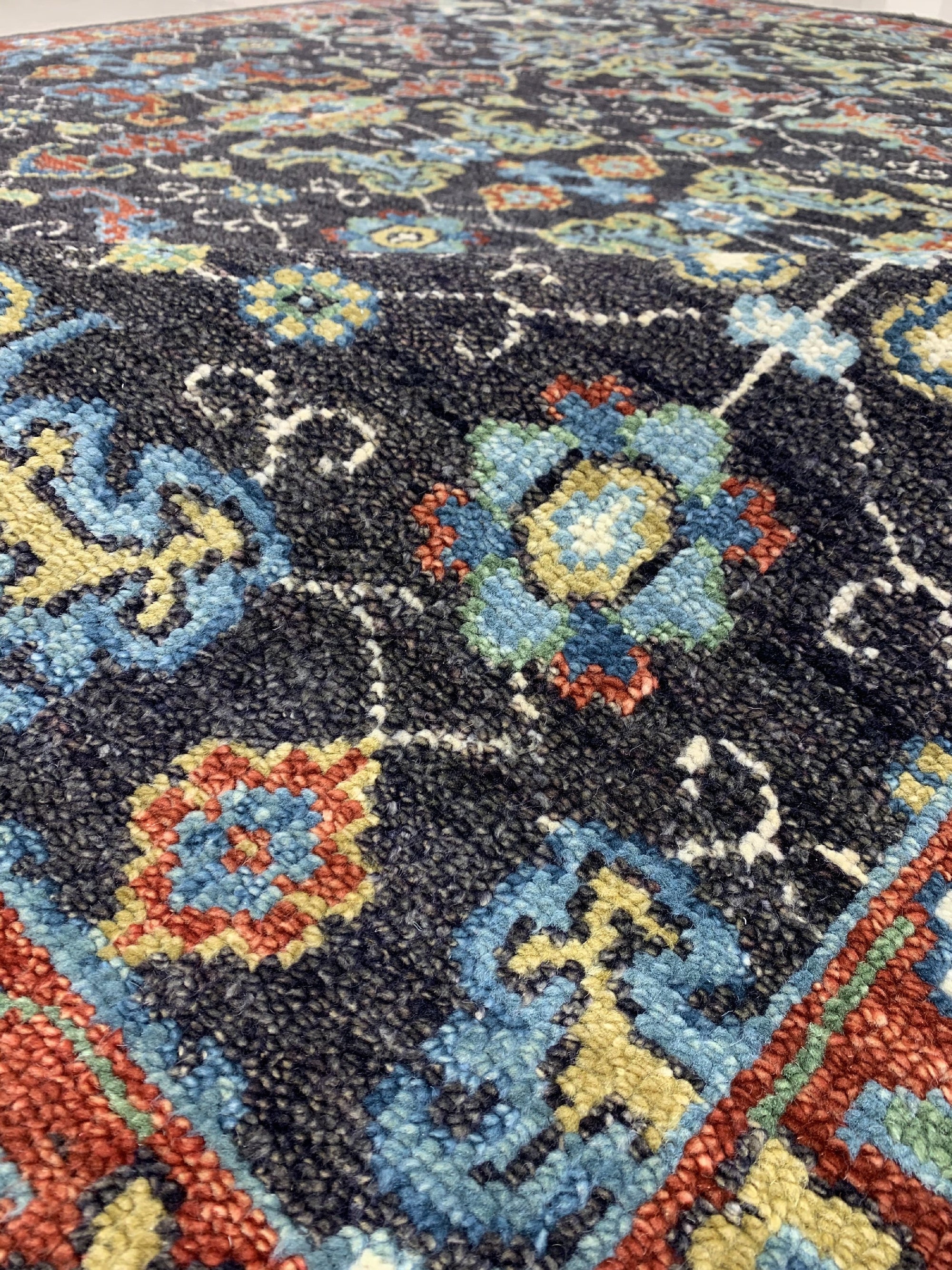 Delicate Oriental Brown Hand Knotted Wool Rug, featuring intricate patterns in warm brown tones, seen showcased on a light-colored floor.