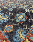 Delicate Oriental Brown Hand Knotted Wool Rug, featuring intricate patterns in warm brown tones, seen showcased on a light-colored floor.
