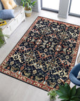 Chloe Oriental Navy Hand Knotted Wool Rug, a navy wool rug hand-knotted with intricate oriental patterns, displayed to showcase its texture and design.