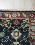 Chloe Oriental Navy Hand Knotted Wool Rug, vibrant navy and cream hues define this hand-knotted wool rug, showcasing a classic oriental design with intricate floral and geometric patterns.