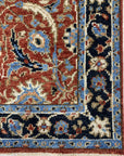 Rustic Oriental Red Hand Knotted Wool Rug, its intricate design and rich red hues providing warmth and texture to a modern living space.