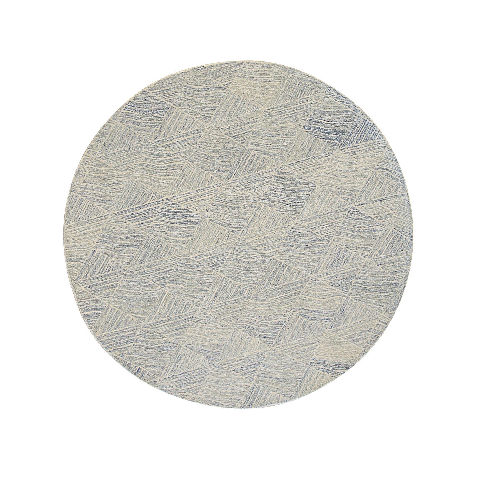 Para Nadia Blue Hand Tufted Wool Rug, a blend of cool blues and creams in a textured, abstract design, anchors a bright living space with modern flair.