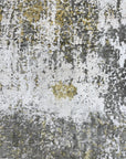 Chic Iris Gold Hand Knotted Wool Rug, displaying a warm, inviting texture and intricate floral-inspired design, adds a touch of luxury and sophistication to a well-lit room.