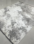 Vibrant Laine Beige Hand Knotted Wool Rug, soft beige tones and subtle textures create a warm, inviting atmosphere in a naturally lit living space. Hand-knotted wool adds luxurious comfort and timeless style.