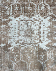Elegant Versatile Coral Hand Knotted Wool Rug, bathed in warm light, shows off its coral hues and intricate hand-knotted texture, displayed in a cozy interior setting.