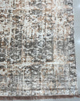 Brenda Isla Coral Hand Knotted Wool Rug, showcasing a soft, coral palette with subtle variations in tone, its hand-knotted construction evident in the dense, luxurious pile, creating a warm and inviting atmosphere within the room setting.