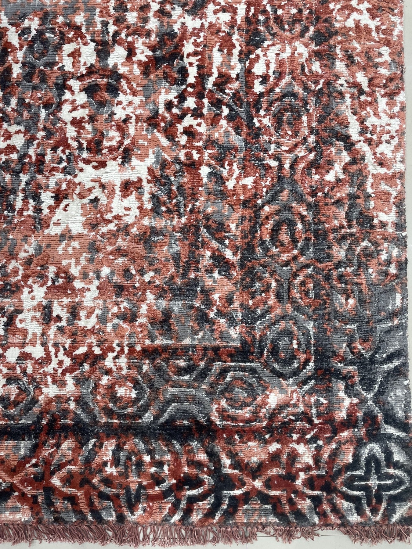 Ava Dahlia Red Hand Knotted Wool Rug, its vibrant red hues and intricate dahlia-inspired design anchoring a stylish living room.